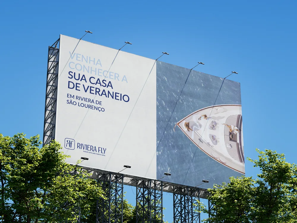 Outdoor da Riviera Fly com a frase “Venha conhecer a sua casa de veraneio”
